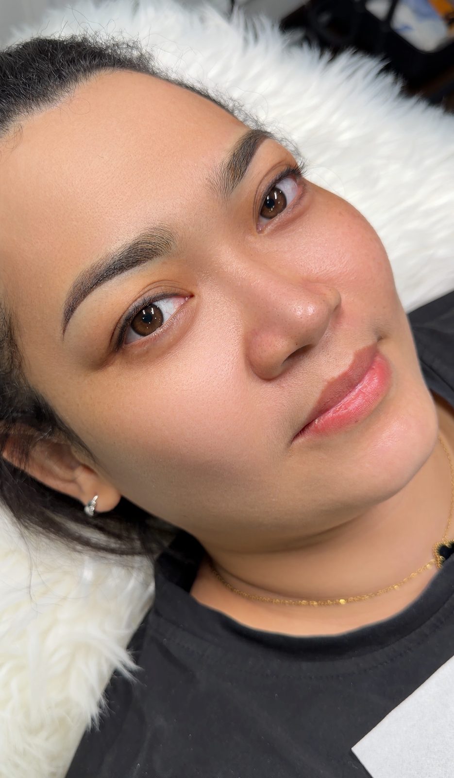 Softly healed brows and lip blush, several weeks after the session